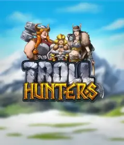 Изображение игрового автомата "Troll Hunters" от Play'N Go, где изображены три воина-викинга: две женщины и один мужчина, одетые в традиционные викингские доспехи. За их спинами виднеются горные вершины, что создаёт атмосферу скандинавской мифологии. Этот слот идеален для любителей скандинавской культуры и поисков приключений.